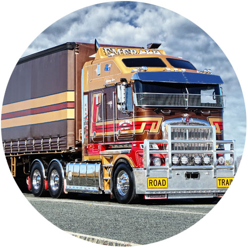 emerald heavy-duty truck on the road