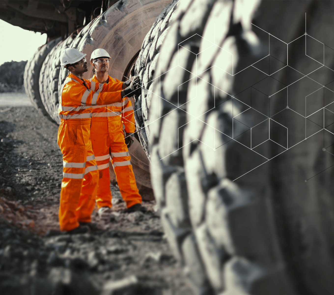 engineers inspecting mining truck