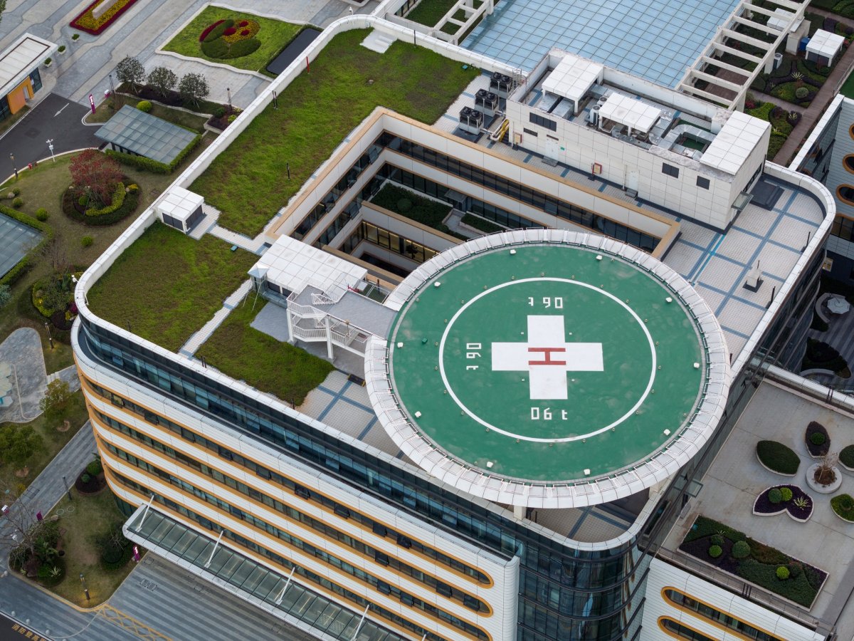 overhead view of hospital roof with helicopter pad