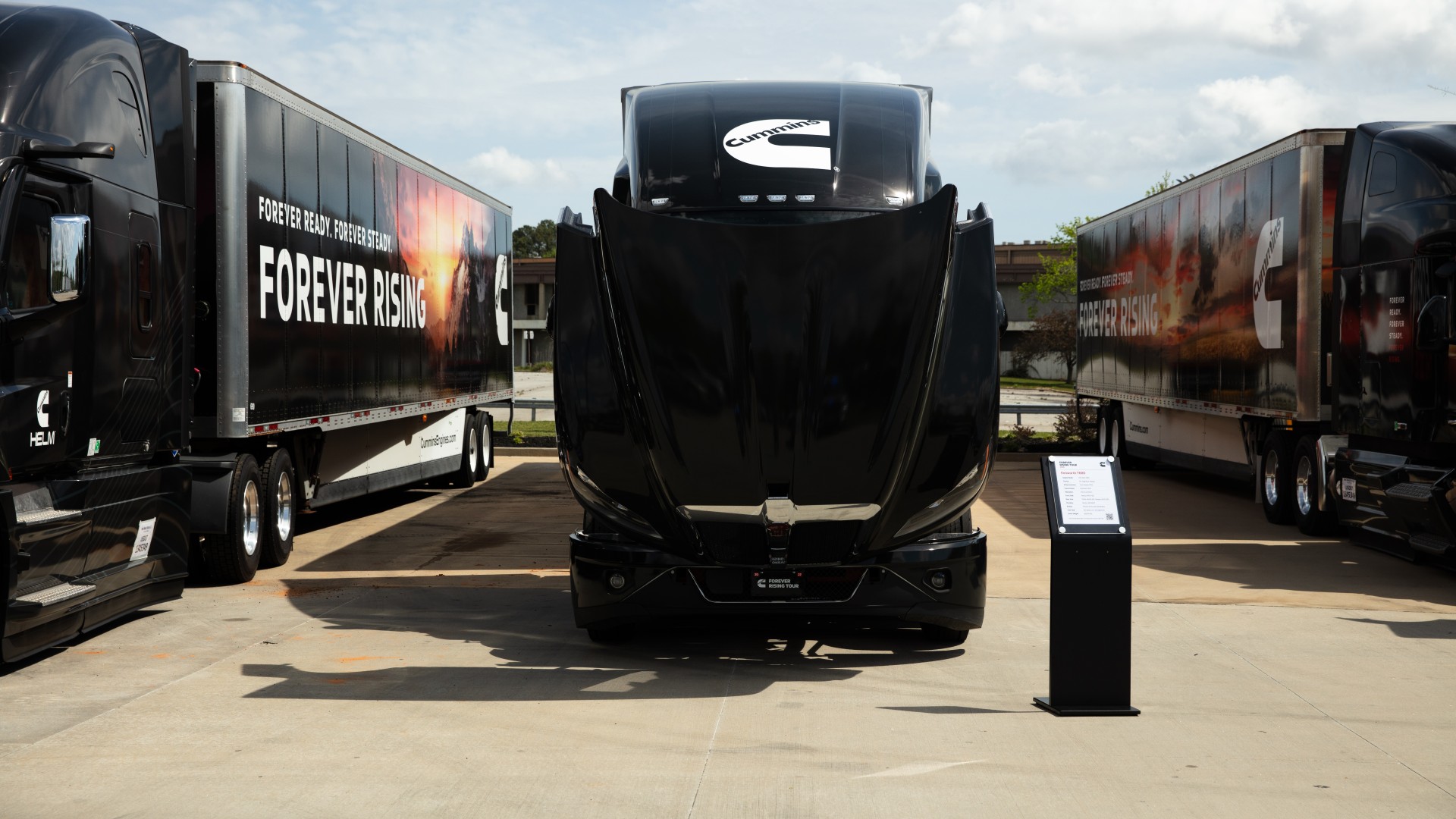 Cummins Forever Rising Tour branded trucks