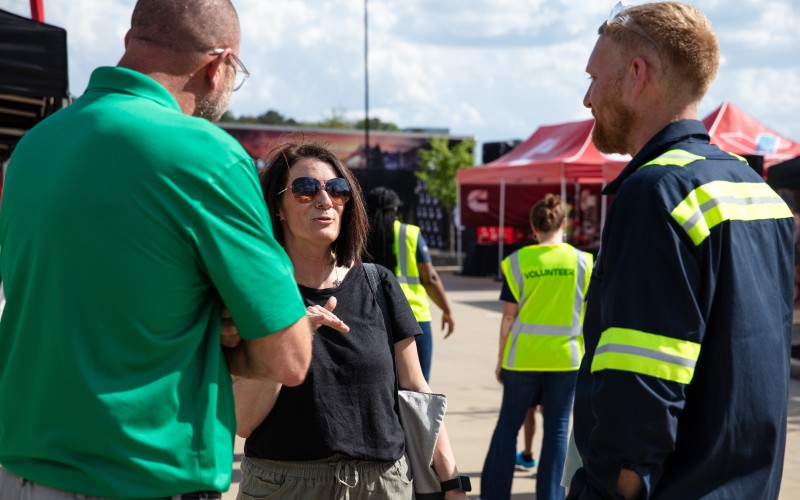Volunteers helping at the Forever Rising Tour