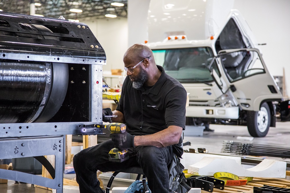 Assembling a natural gas tank for installation on a truck chassis