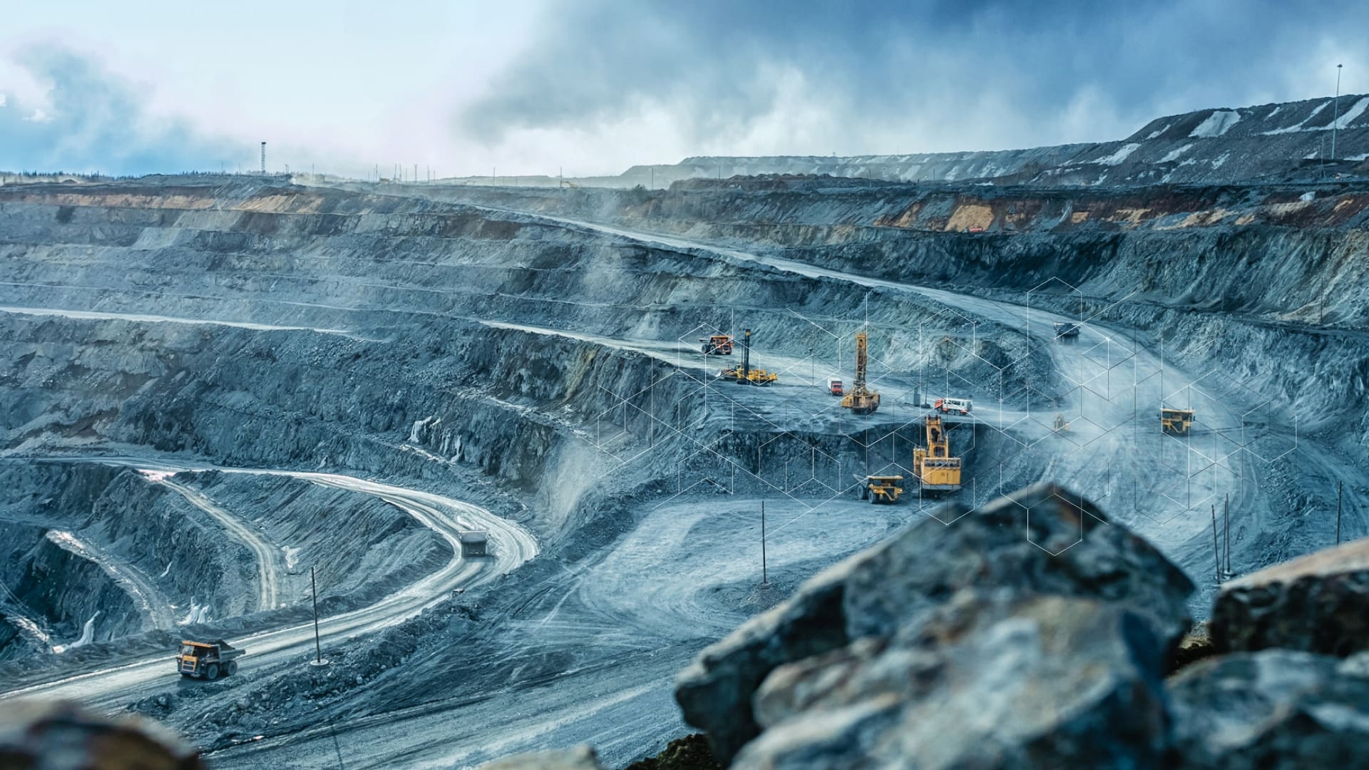 large mining operation with mining trucks