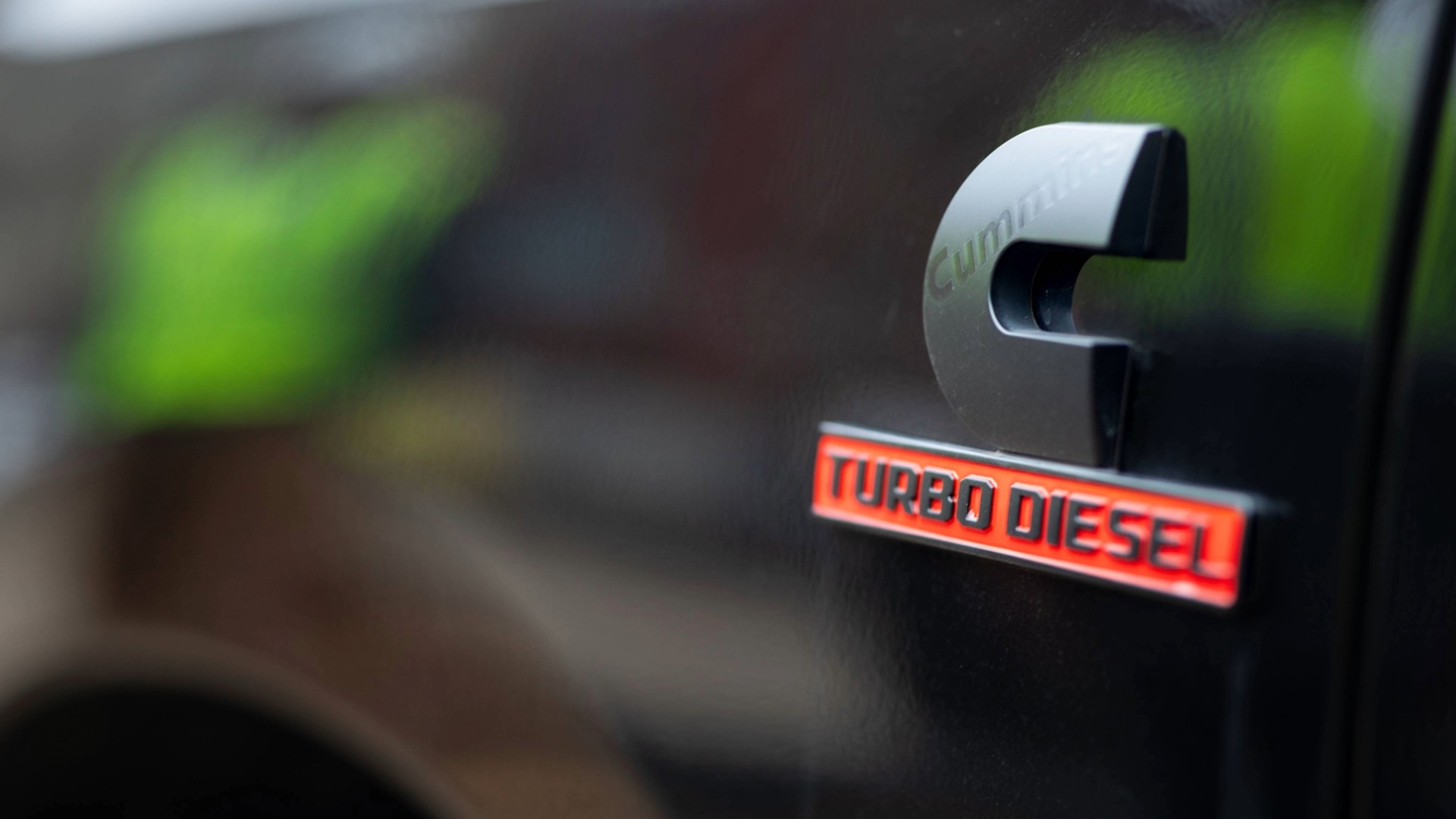 Cummins Turbo Diesel bade on a black truck
