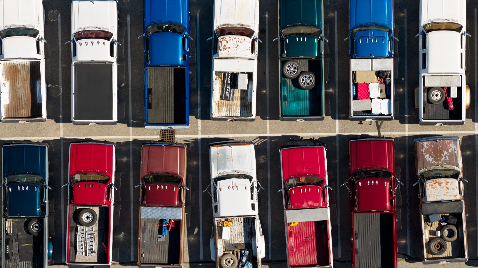 Old Ram trucks parked in a parking lot
