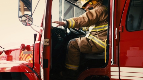fireman in firetruck
