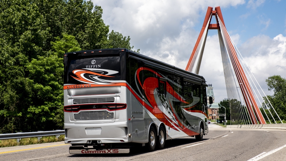 Bus about to drive over a large bridge