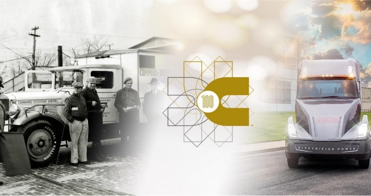 banner displaying cummins' 100th anniversary with images of early truck and modern truck models