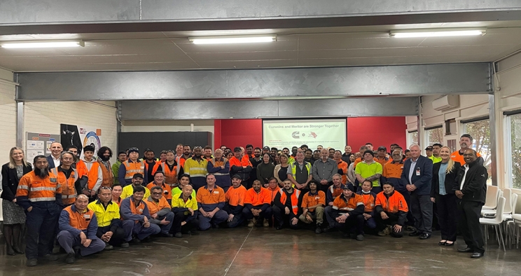 Cummins-Meritor Asia Pacific employees gathered in a room