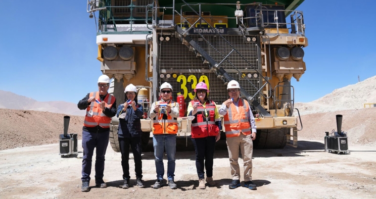 Cummins team in front of First Commercial Hybrid-Electric Ultra-Class Mining Haul Truck 