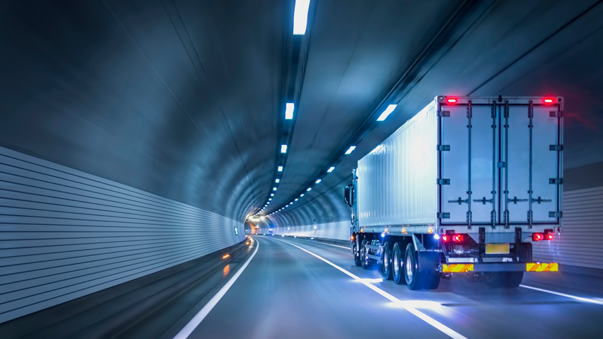 Semi driving through tunnel