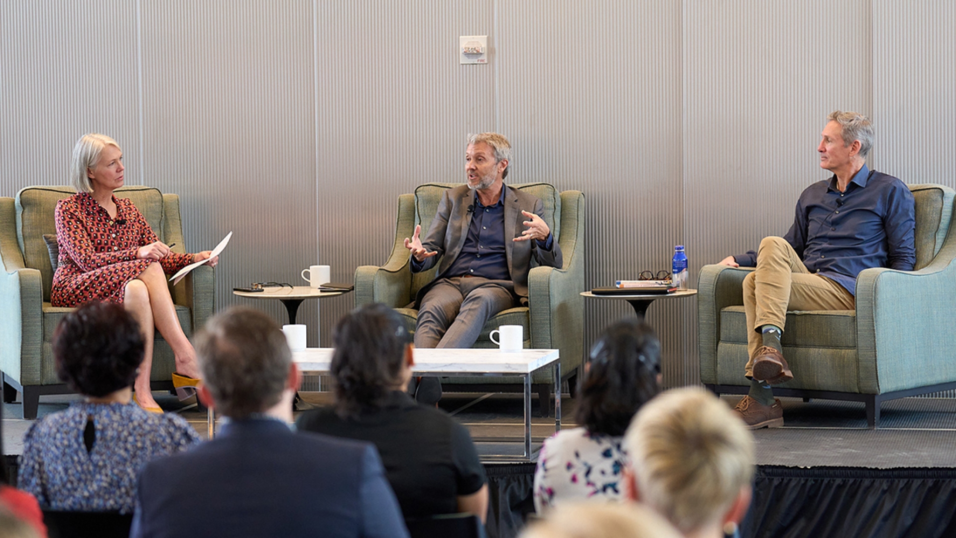 Mary Chandler moderating a panel with Tom Linebarger and Gary Barker, CEO of Promundo-US