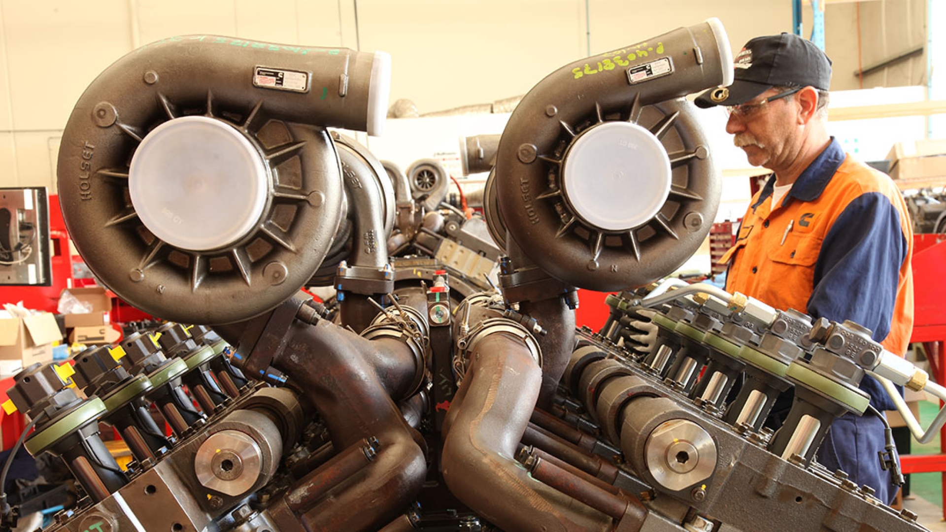 Employee working on QSK60 mining engine