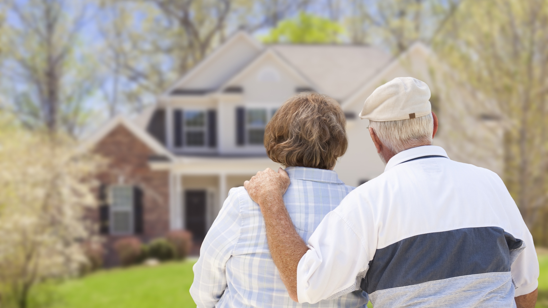 couple looking at their home