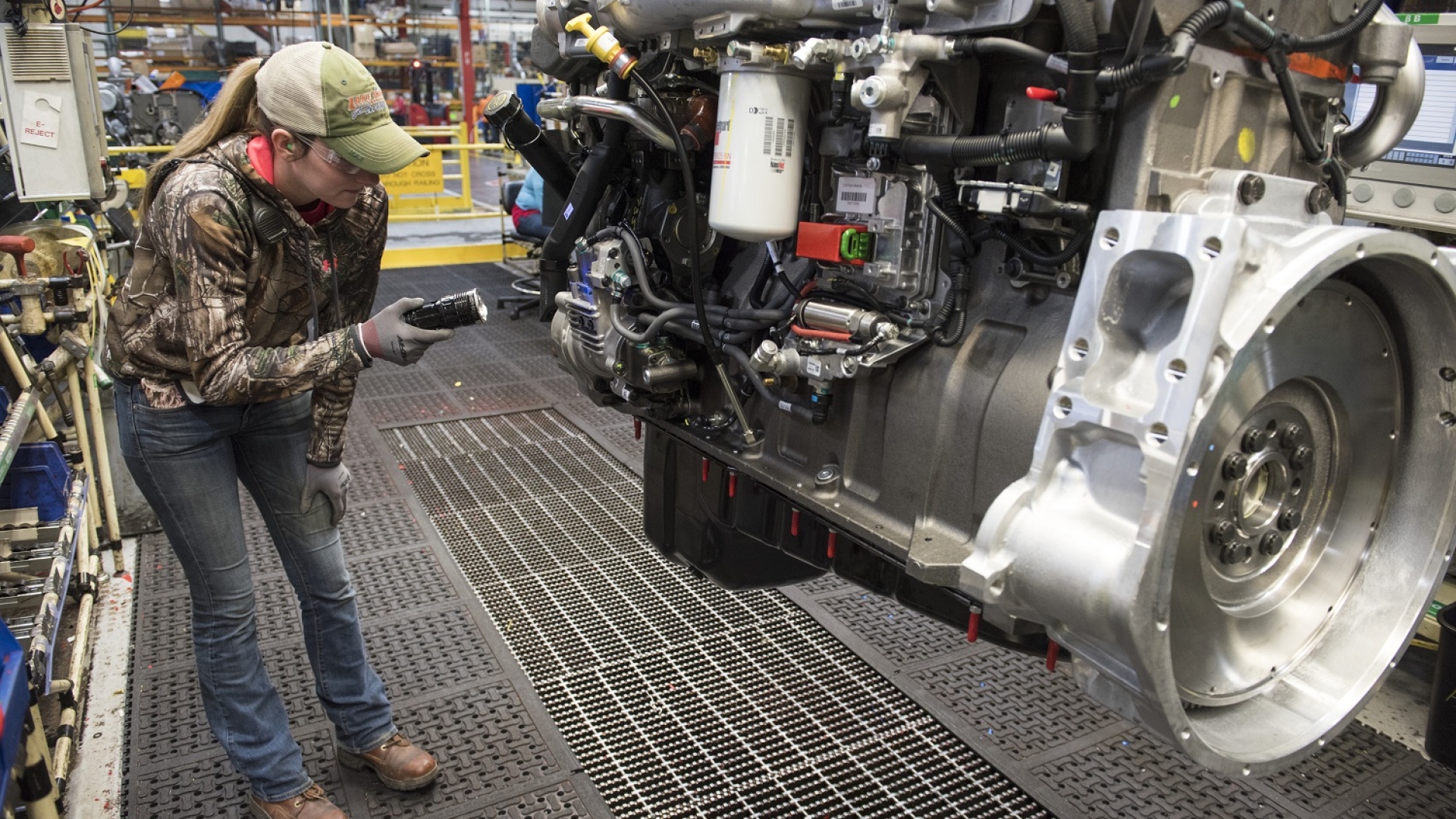 A Cummins employee inspects an engine at the company's Jamestown Engine Plant in Jamestown, New York (USA). The plant, which produces several engine models, is nearing the production of its 2 millionth engine.