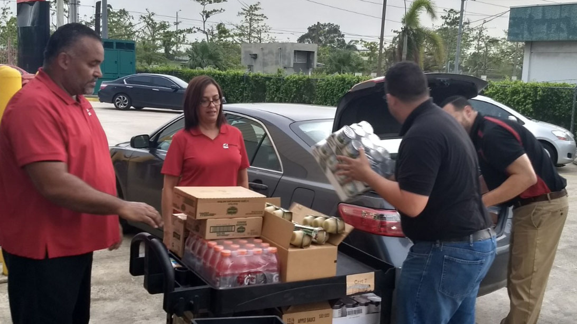 Cummins employees in Puerto Rico unload supplies to keep the branch going over long hours.