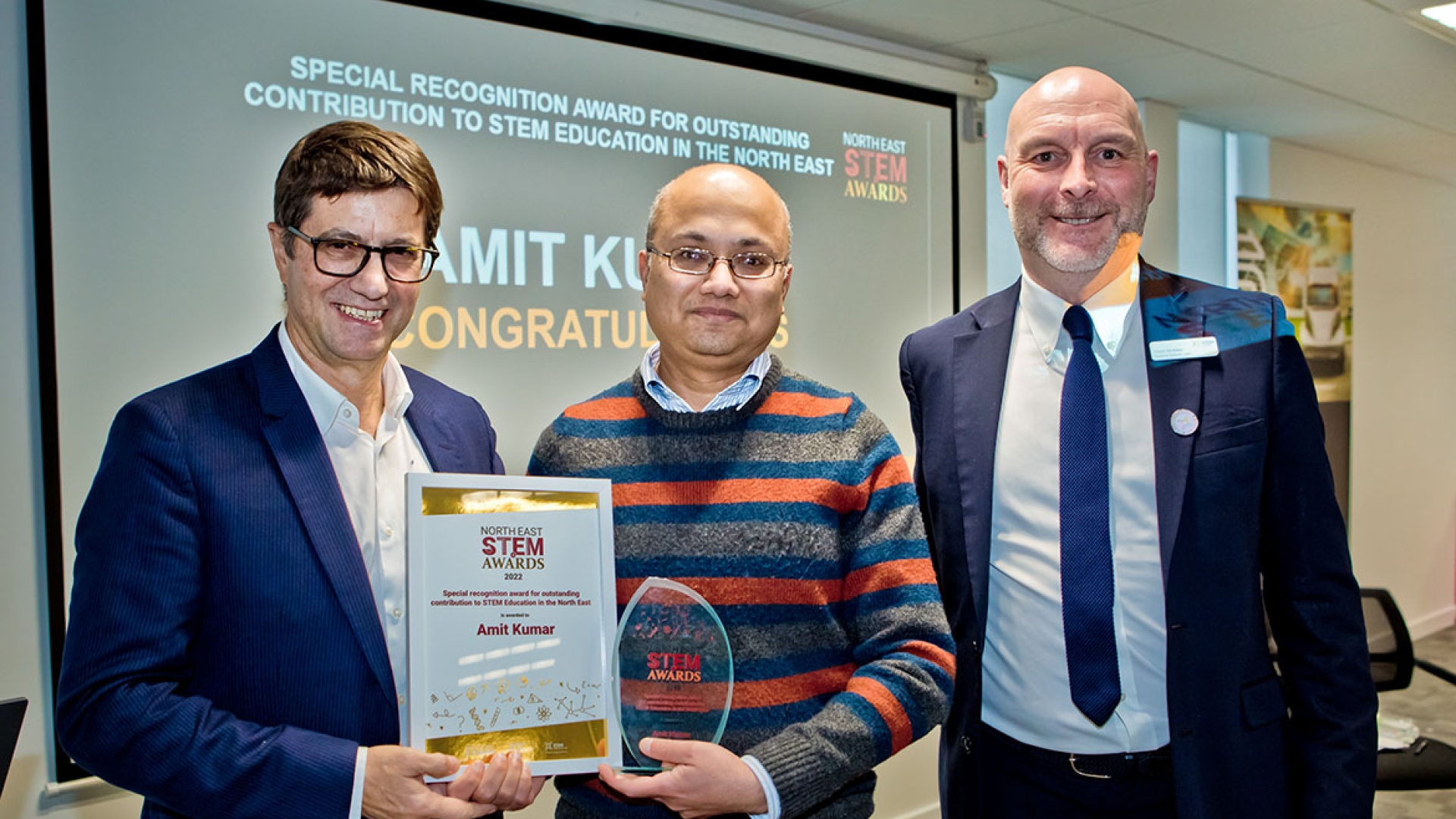 Amit Kumar receiving his STEM award