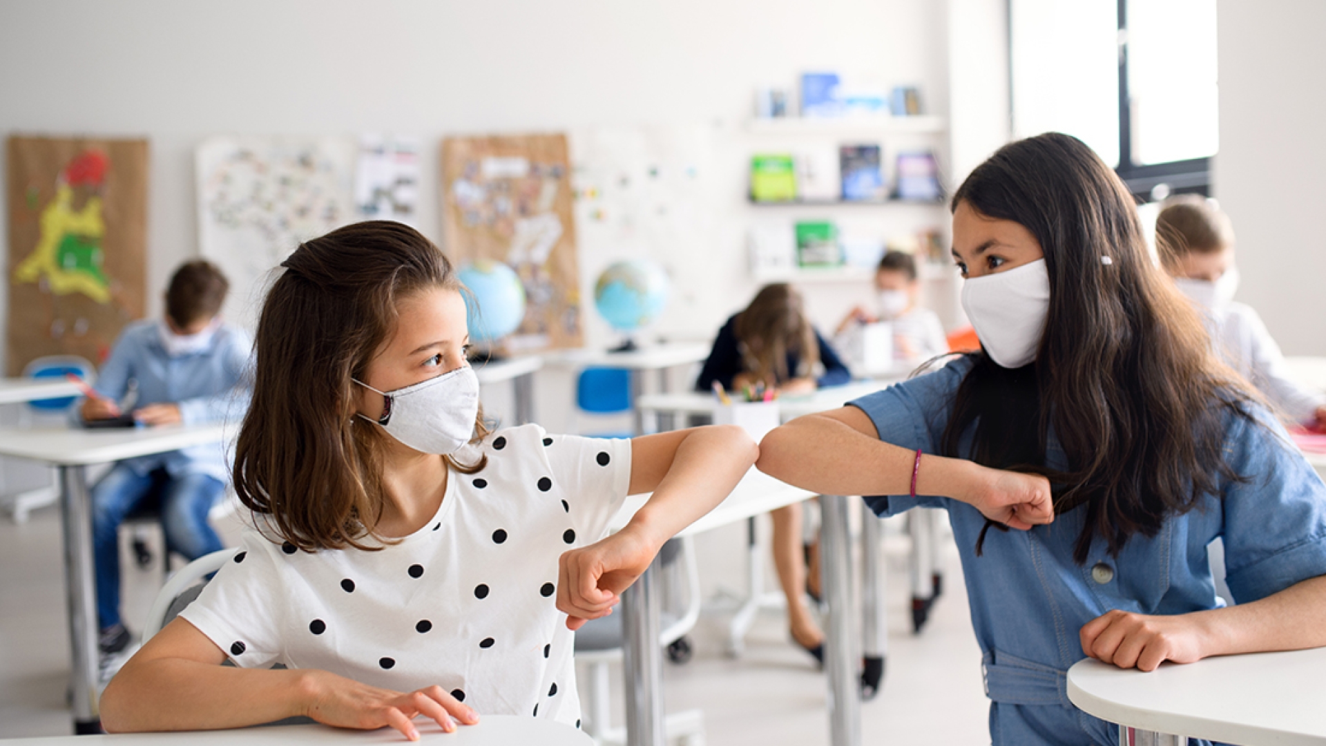 Girls wearing masks