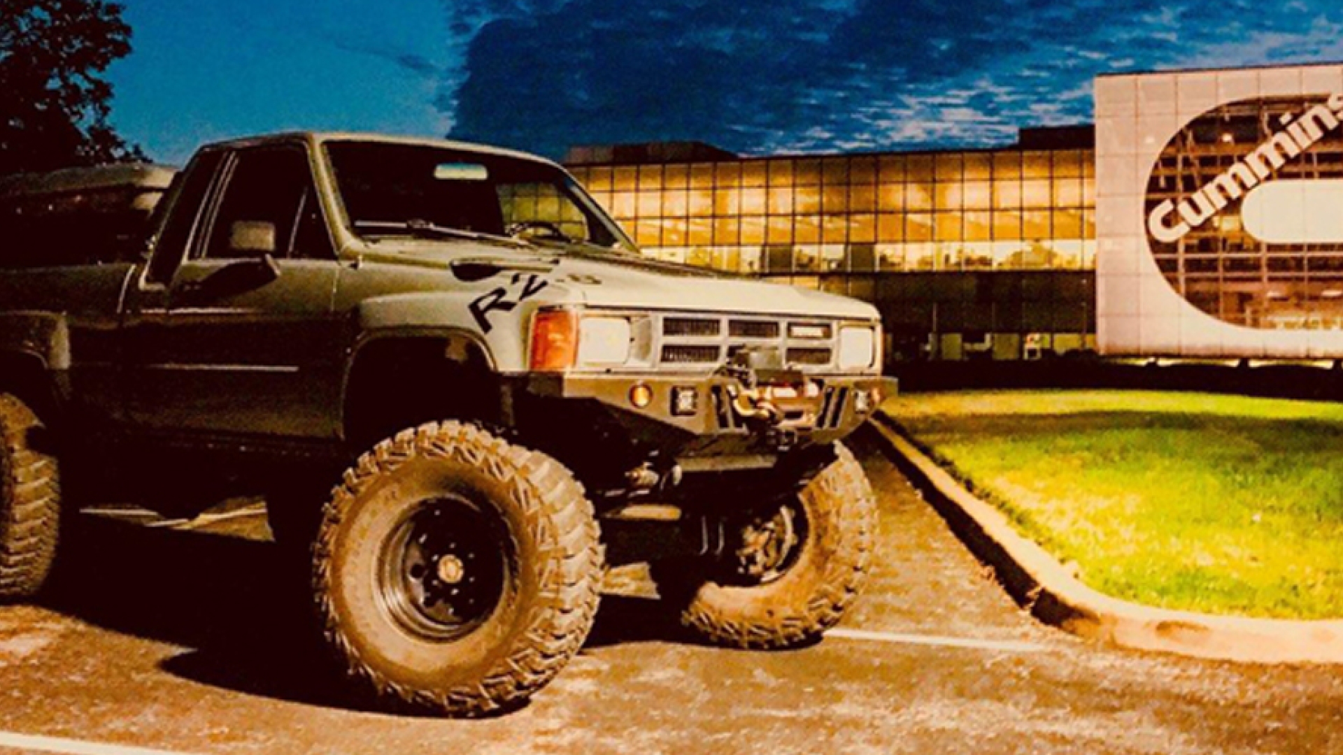 Repowered TAV Toyota Xtra Cab in front of Cummins building