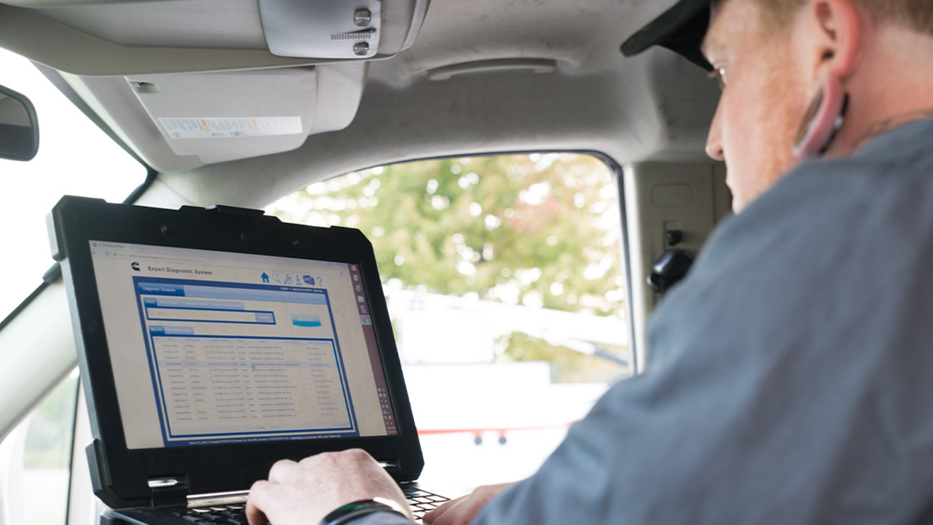 person viewing diagnostic tool on computer