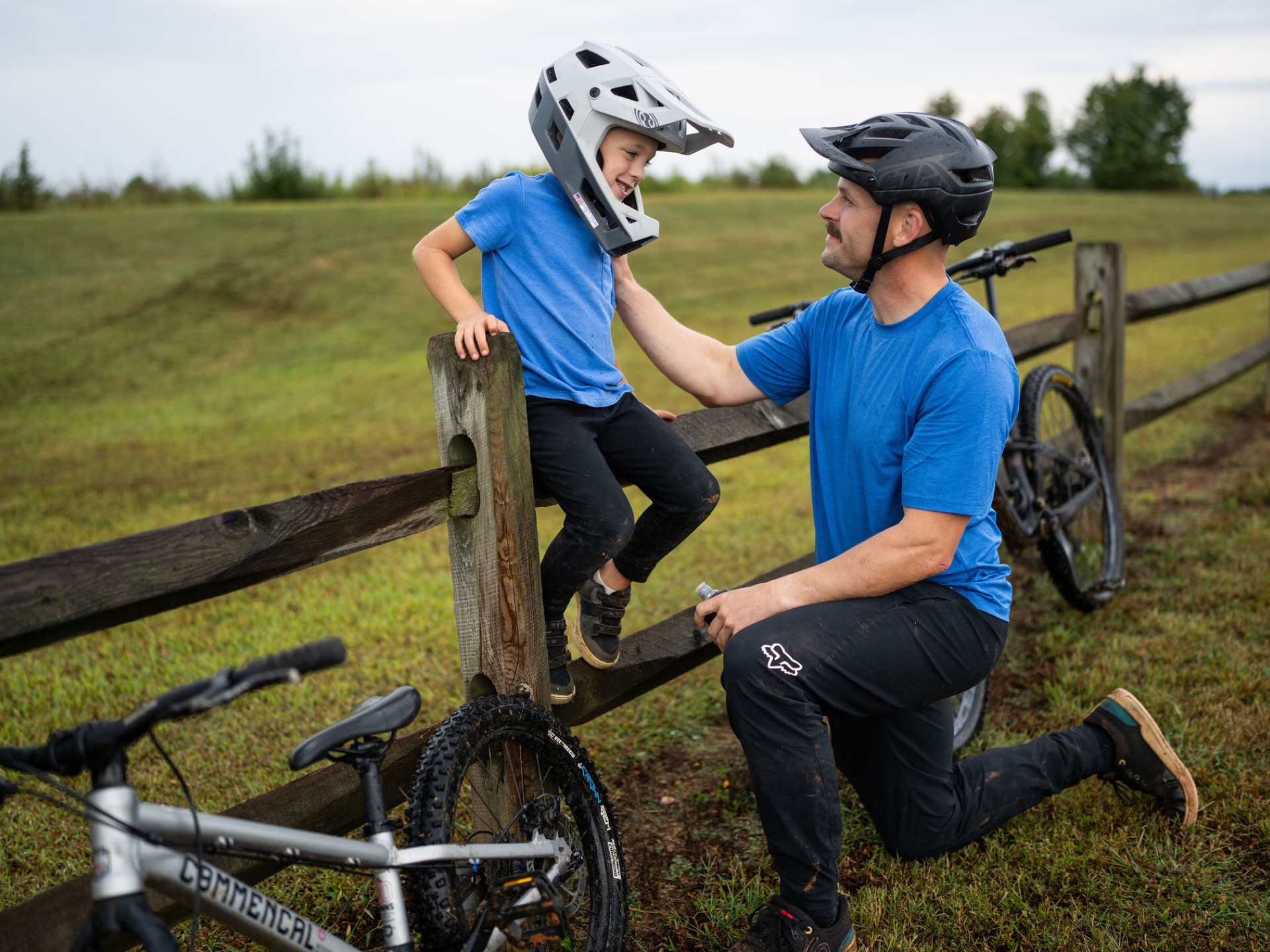 Father and son taking a break during a bike ride