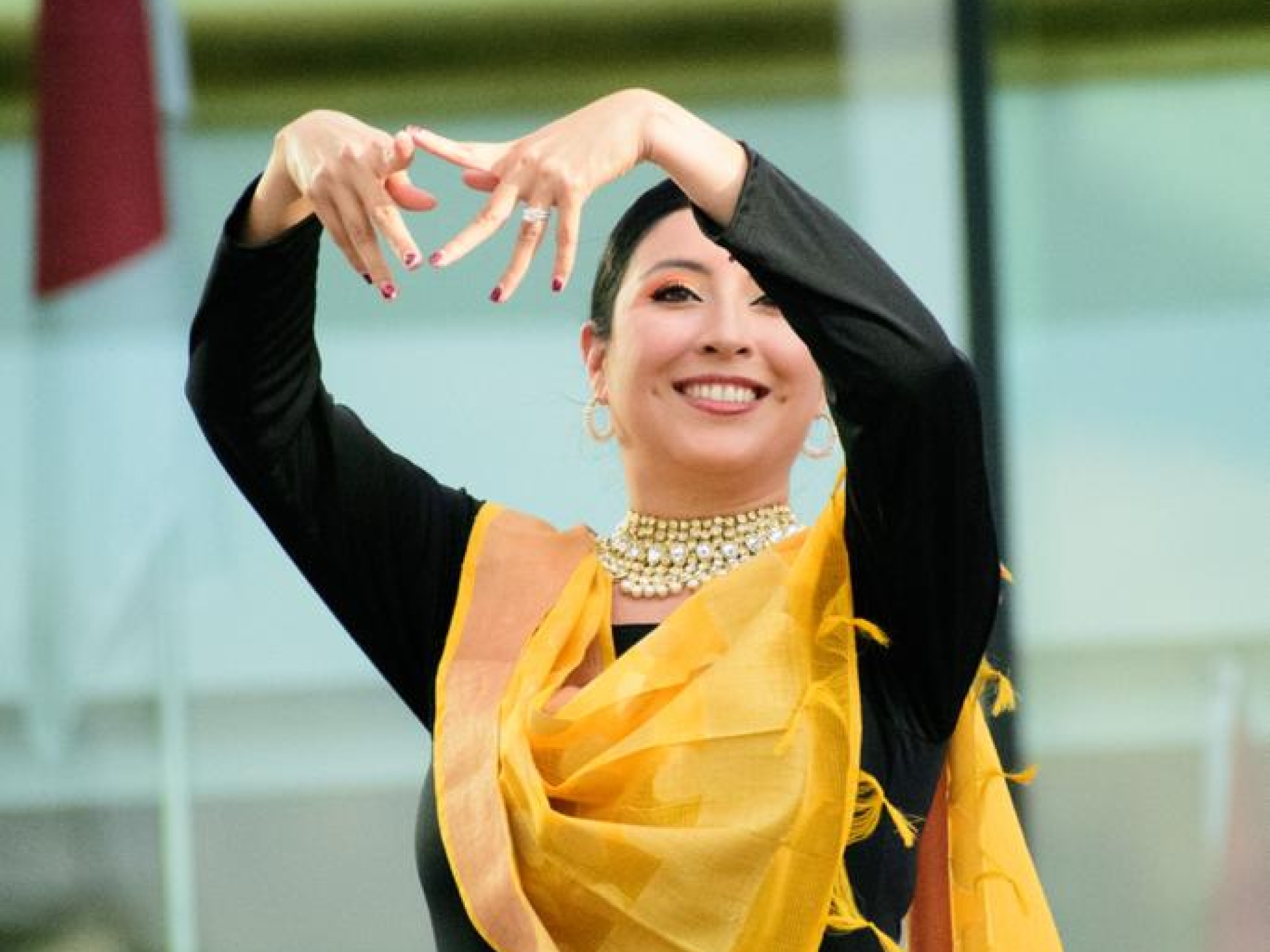 Amy performs during a community engagement dance event.