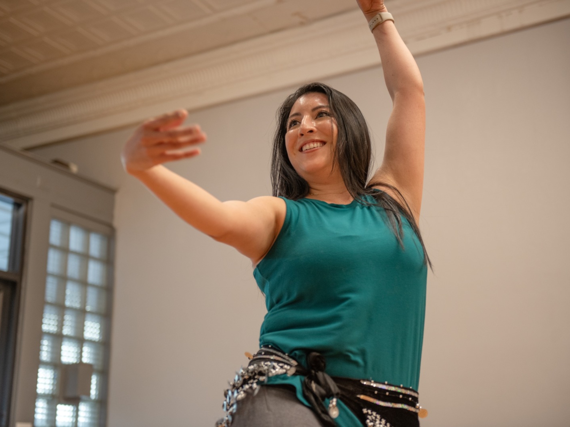 Amy performs a dance as part of her community engagement.