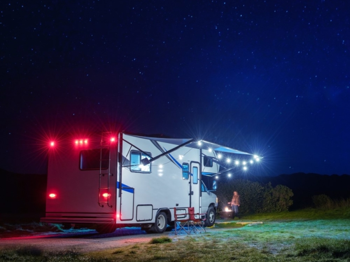 rv camping at night with lights on