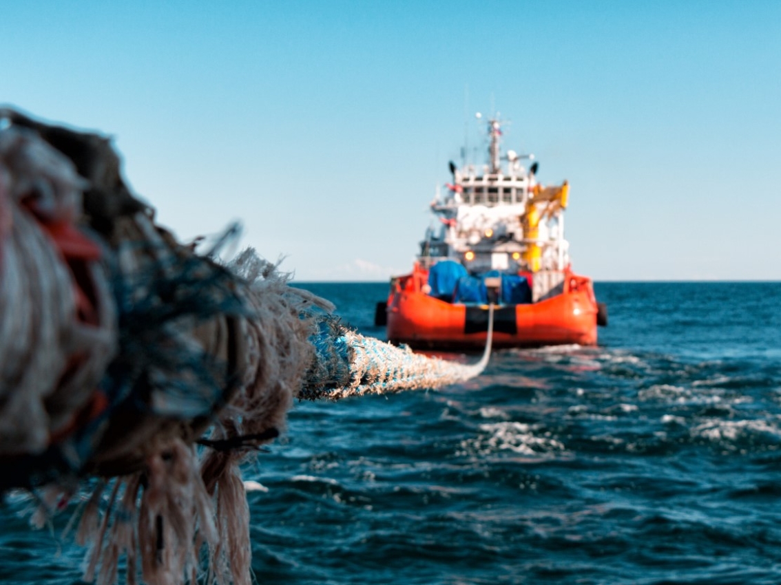 Boat attached to a dock via rope