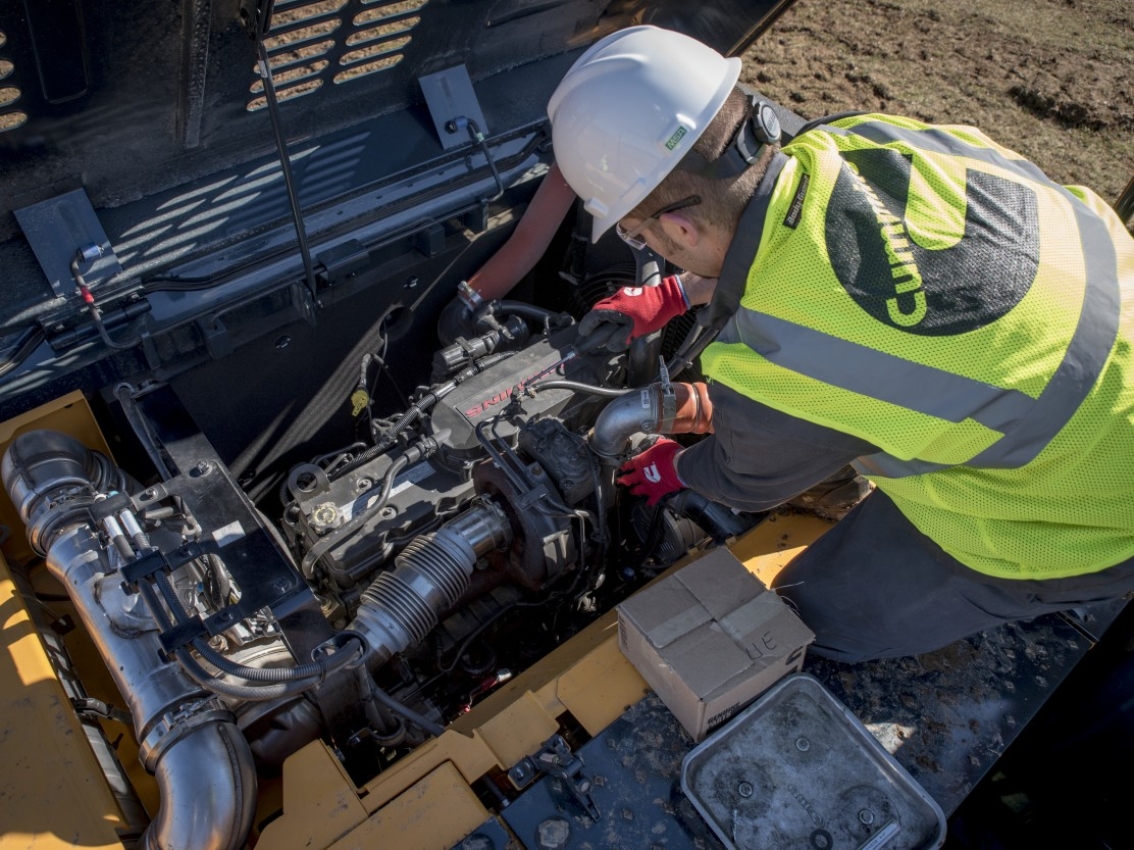 Cummins representative providing service