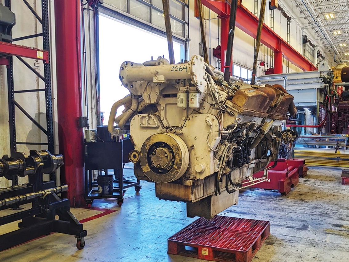 QSK50 Tier 2 engine hanging in garage