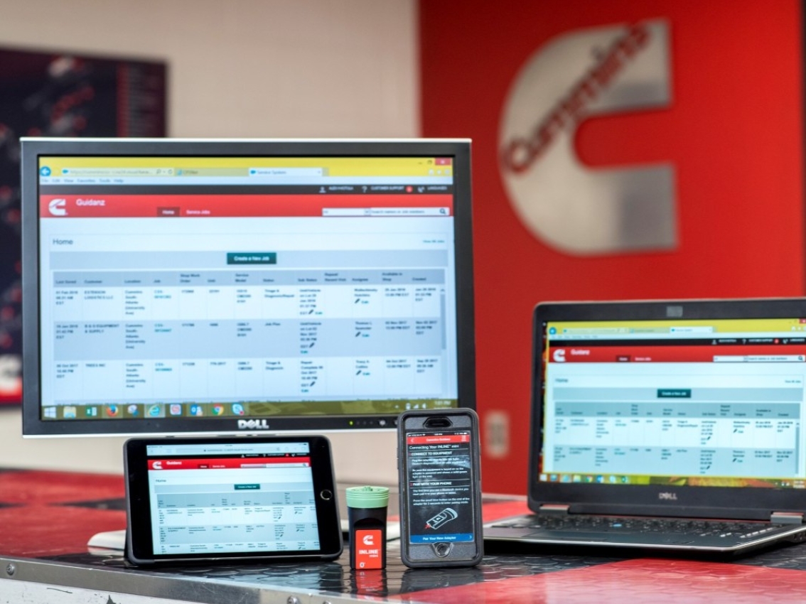 Cummins Dealer Portal accessed across desktop, laptop, tablet and mobile devices